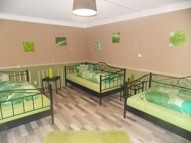 Ferienwohnung Grün - Schlafbereich - Souterrain