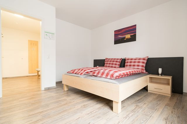 Anitas Altstadtpension Juniorsuite Schlafzimmer 1