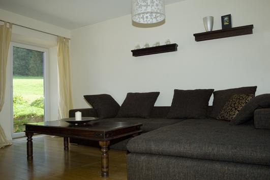 Wohnzimmer mit Schlafsofa
