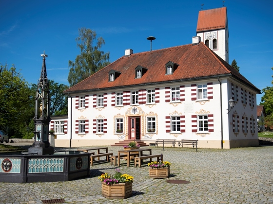 Dorfplatz Eglofs mit dem Dorfbrunnen