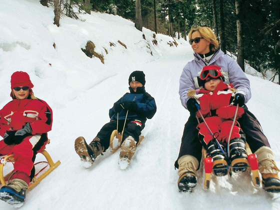 Schlittenfahren mit Kindern