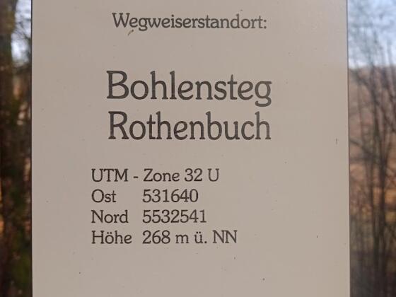 Standortschild Wegweiser Bohlensteg