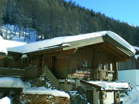Haus Dorf Alm - Hausansicht Winter