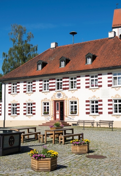 Dorfplatz Eglofs mit dem Dorfbrunnen