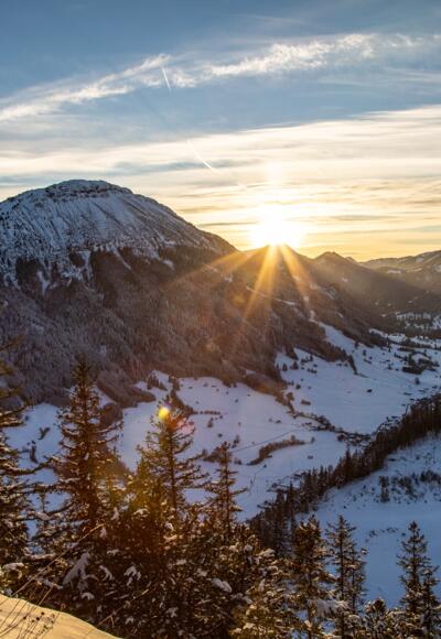 Sonnenuntergang über dem Pfrontener Tal vom Falkenstein aus gesehen