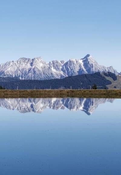 12erKogel Speicherteich mit dem Steinernen Meer von Saalfelden