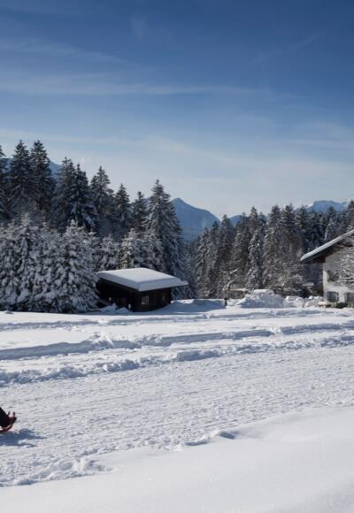 inzell-winter-leute-rodeln-aktiv_ff