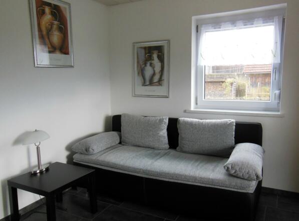 Wohnzimmer mit Schlafcouch für 2 Personen
