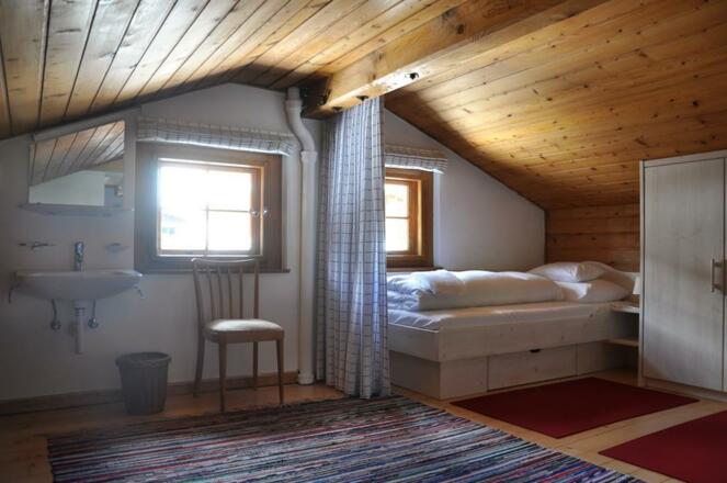 1 Schlafzimmer Dachgeschoß