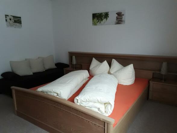 Schlafzimmer mit Couch