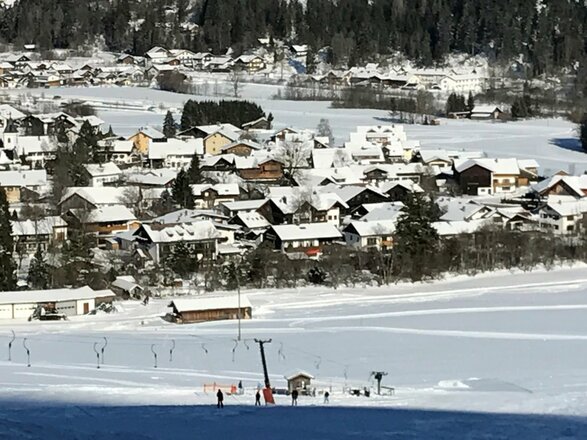 Winter mit Blick auf die AlpLodge