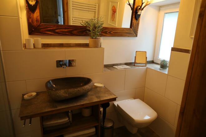 Badezimmer in der Ferienwohnung Oachkatzl Volders