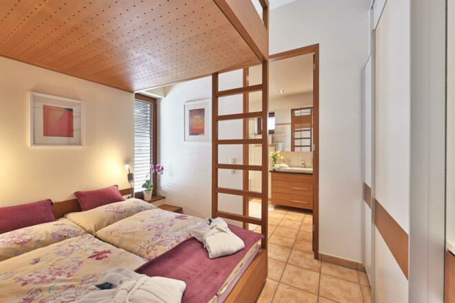 hausdrmuxel_appartement_omeshorn_schlafzimmer02