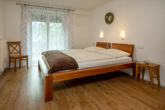 Schlafzimmer mit Balkonzugang