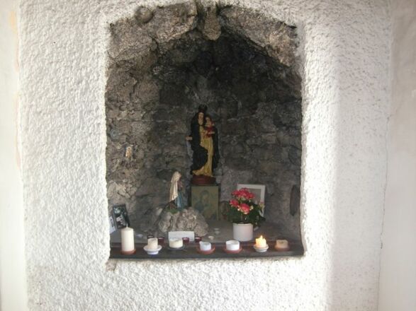 Gebetskerzen in der Wallfahrtskirche St. Leonhard