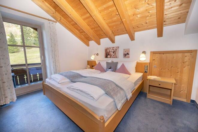 Wohnung Fichte, Bett mit offenen Fußende