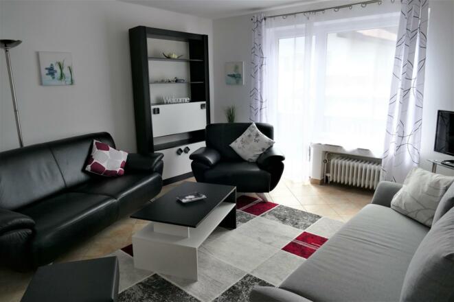 Wohnzimmer mit Südbalkon Wohnung 2