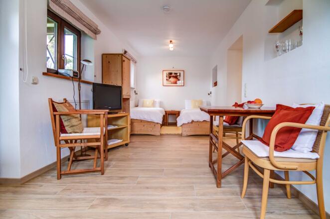 Garten-Appartement Wohnraum