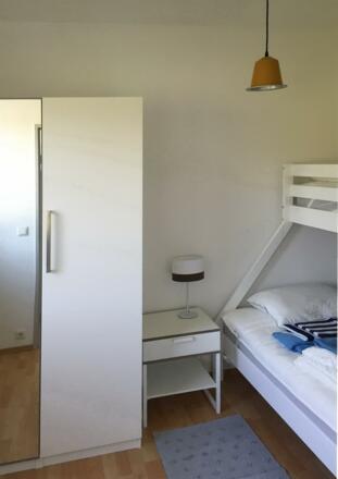 Zweites Schlafzimmer mit 3 Betten
