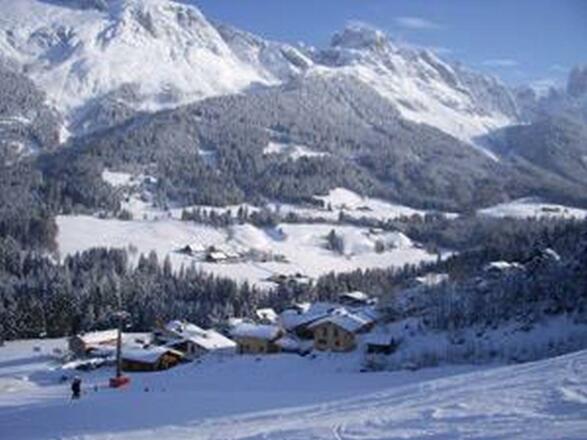 Sicht auf die Skipiste direkt vom Chalet