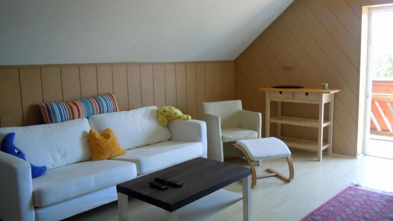 rooming green seeblick-wohnbereich