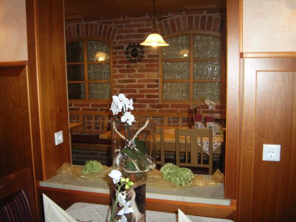 Blick Wintergarten zum Stammtisch