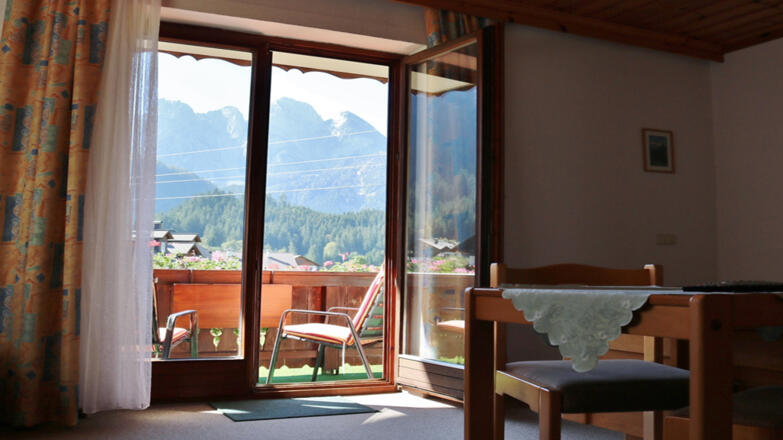 Schlafzimmer mit Sitzgelgenheit