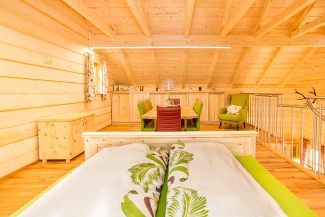 Primushäusl Chalet Galerie Bett