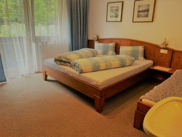 Dreibettzimmer in der Wohnung