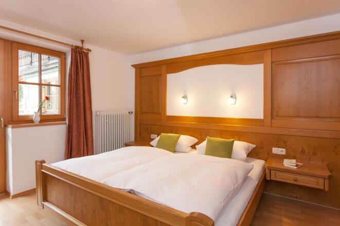 Schlafzimmer - Ferienwohnung Nagelfluh