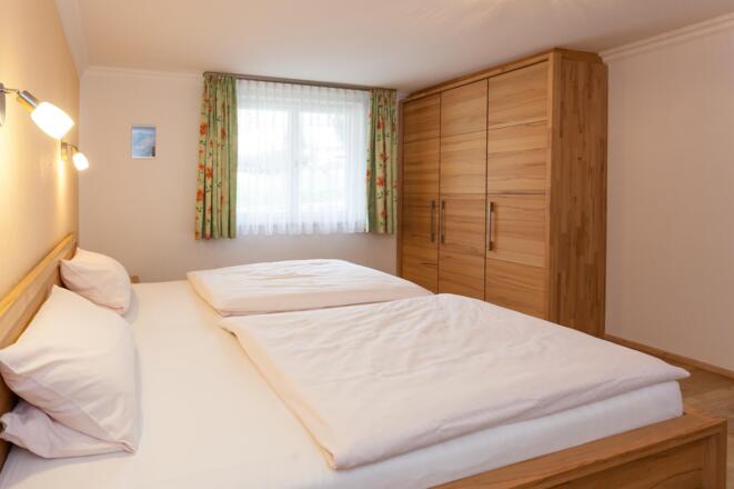 Schlafzimmer - Ferienwohnung Blumenwiese
