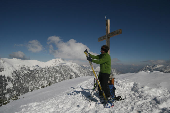 Abfellen am Gipfelkreuz
