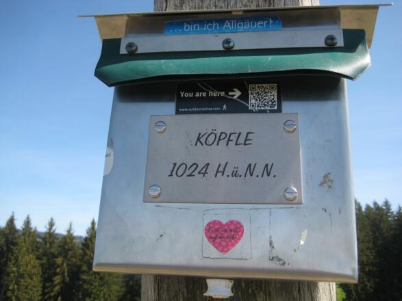 Dann auch mal ein Halt an einem Gipfelkreuz.