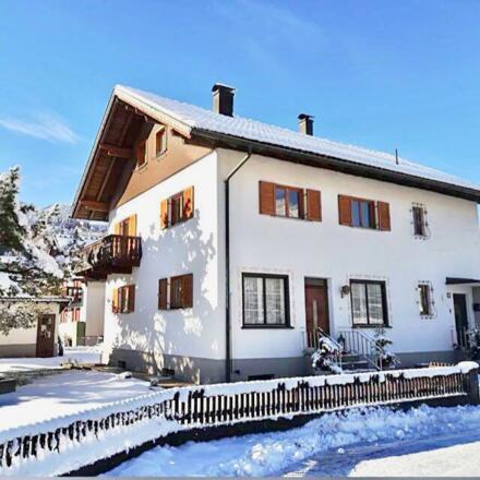 Haus in der Winterlandschaft