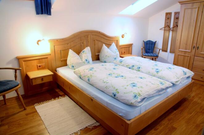 Ferienwohnung Seeblick Schlafzimmer vom Gästehaus Kleinbuch