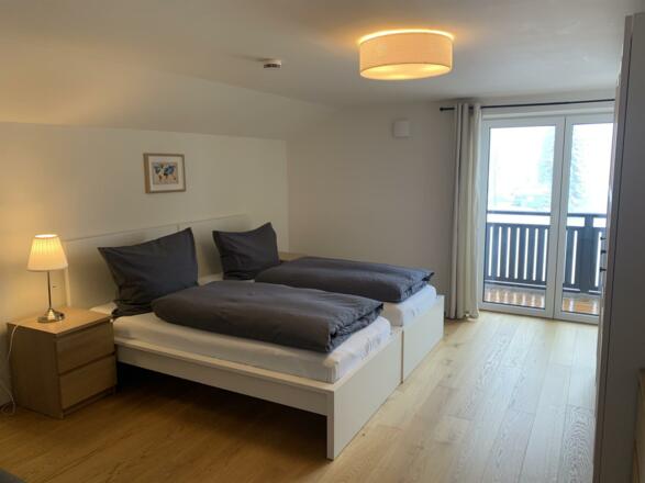 Schlafzimmer mit Balkon