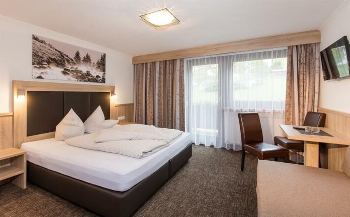 Dreibettzimmer mit getrennten Betten