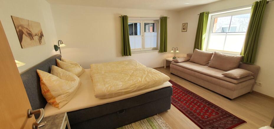 Schlafzimmer mit Couch