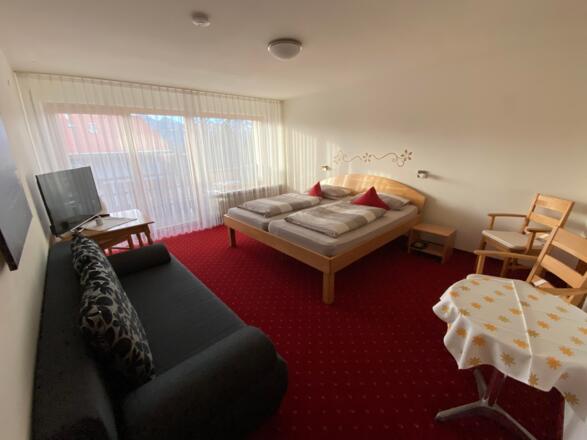 Mond-FEWO - Schlafzimmer mit Schlafsofa
