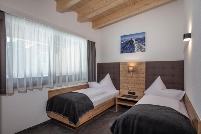 Schlafzimmer mit Einzelbetten