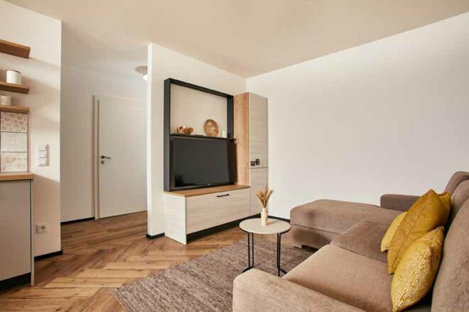 Wohnzimmer - Apartment gelb mit 1 Schlafzimmer-Homebound Apartments