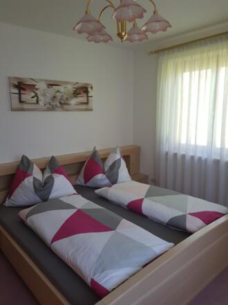 Schlafzimmer Apartment Bergblick