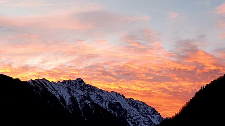 Wolkenspiel mit Abendrot
