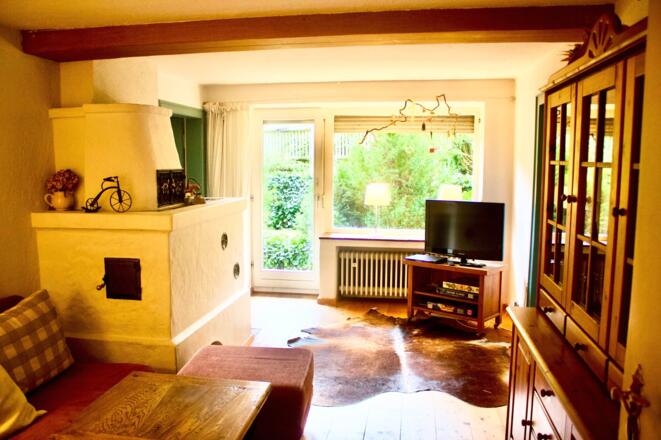 Wohnzimmer+mit+Kachelofen