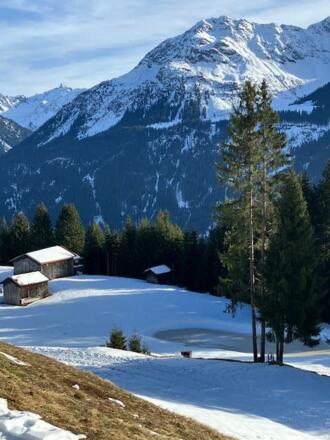 Maisäß Winterbild Süd mit See
