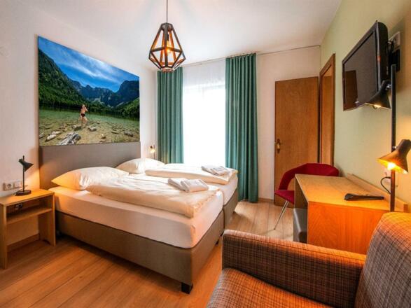 modernes-3-bettzimmer-mit-balkon
