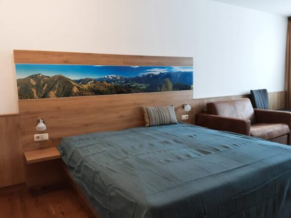 Doppelbett im Apartment Bergidylle
