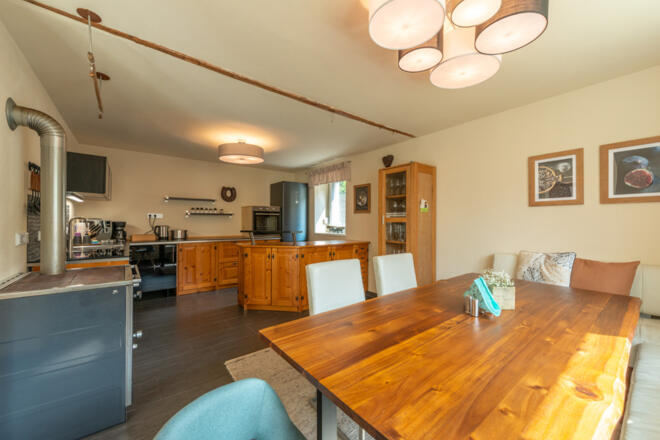 Ferienhaus Naschgarten Bad Goisern - Wohnküche mit Essecke