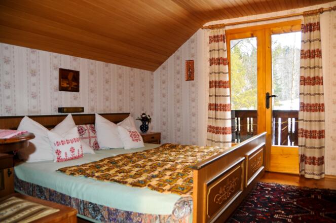 Schlafzimmer mit Balkon