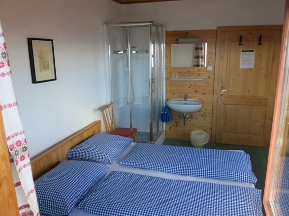 eines der gemütlichen Zimmer